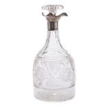 A George V silver mounted and clear glass decanter and stopper, maker Walter & Charles Sissons,