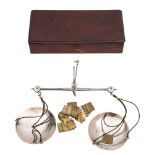 A pair of George IV polished steel and silver balance scales: the circular pans marked for George