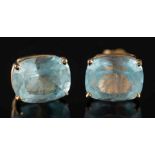 A pair of cushion-shaped aquamarine single-stone ear-studs: in four claw setting, stamped '14K', 2.