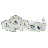 A First Period Worcester porcelain part tea service: of lobed form painted in blue in the