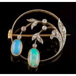 An opal and diamond circular brooch: mille-grain set with graduated,