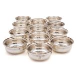 A set of twelve Edward VII silver finger bowls, maker Goldsmiths & Silversmiths Co Ltd, London,