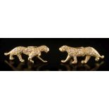 A pair of diamond mounted feline ear studs: set with circular, brilliant-cut diamonds,