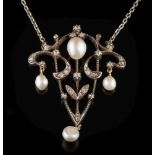 A gold, silver, baroque pearl and diamond pendant: of openwork foliate design on platinum chain.