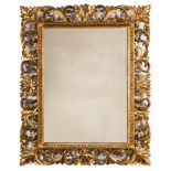 A late 19th Century carved giltwood Florentine frame wall mirror:,