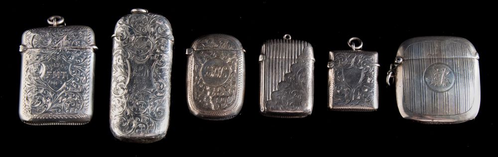 A Victorian silver vesta case, maker Henry Pope, Birmingham, 1899: initialled,