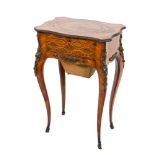 A 19th Century French kingwood, parquetry and gilt metal mounted work table:,