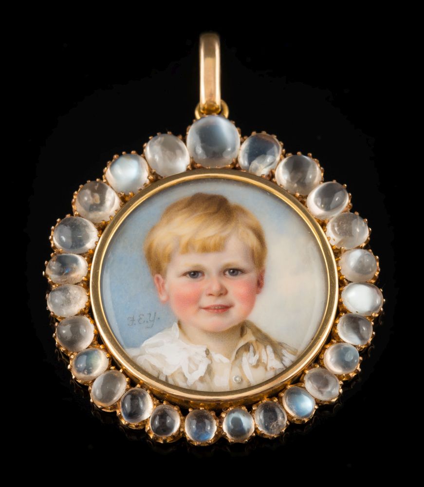 A gold and graduated moonstone circular miniature portrait pendant: depicting Walter. F.