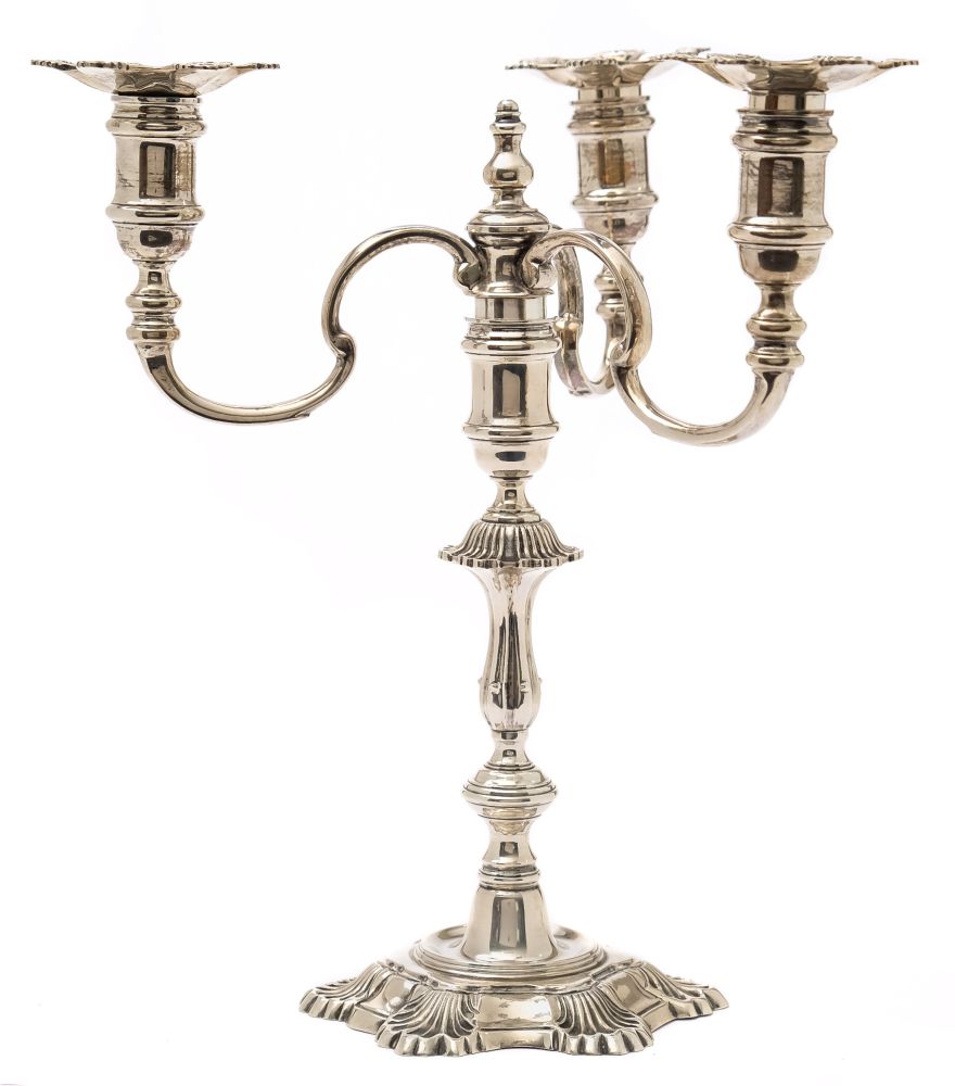 An Elizabeth II silver three-branch candelabrum in the 18th century style,