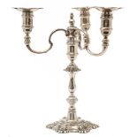 An Elizabeth II silver three-branch candelabrum in the 18th century style,