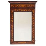 A 19th Century Dutch mahogany and floral marquetry pier mirror:, bordered with sycamore lines,