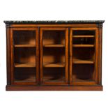 By Holland and Sons A Victorian mahogany and ebonised cockbeaded low bookcase:,