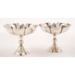 A pair of Edward VII silver pedestal sweetmeat dishes,