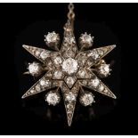 A late 19th century gold, silver and diamond six-pointed star brooch: 32mm wide,