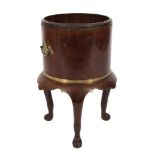 An 18th Century Dutch mahogany drum-shaped jardiniere:,