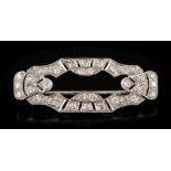 An Art Deco diamond mounted brooch: of rounded rectangular design,