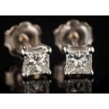A pair of 18ct white gold and princess-cut diamond single-stone ear studs: each approximately 0.