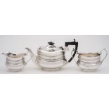 An Edward VII silver three-piece tea service, maker Frank Cobb & Co Ltd, Sheffield,