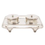 A George V silver inkstand, maker C S Harris and Sons Ltd, London 1919:, of rectangular outline,
