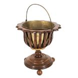 A 19th Century Dutch mahogany and brass swing-handled brazier type bucket:,