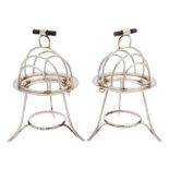 Asprey & Co, a pair of silver plated toast racks: of domed form with four divisions,