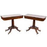 A pair of late Regency rosewood rectangular card tables:,