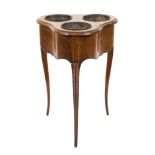 An 18th Century French fruitwood wine cooler:, of trefoil outline,