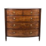 A Regency mahogany bow-fronted chest:, the top with a reeded edge,