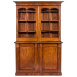 A Victorian mahogany bookcase:, the upper part with a moulded cornice,