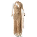 A late 20th century sequined nylon evening dress and shawl:, in beige and gold.