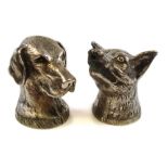 A silver plated two-piece cruet set in the form of fox and hound heads:, 6cm high.