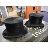 A black silk top hat by Pinder & Tuckwell, Exeter:, another by Charles Edwards,