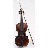 A late 19th century German student violin in case with single bow:, with scrolling head stock,