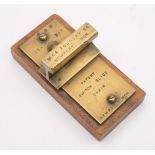 A brass desk model of a 'Patent switch slide chair' by Isca Foundry Co, Newport:. 10cm long.
