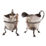 Two late Victorian silver presentation cream jugs for the 2nd Royal Inniskilling Fusilers,