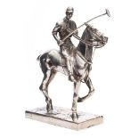 An Elkington & Co silver plated figure of a Polo player on horseback:,