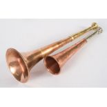 A copper hunting horn with nickel mouthpiece by George Parker and Sons,