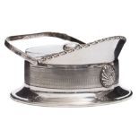 An early 20th century silver plated butter dish in the form of an inverted peaked cap:,