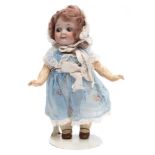 A German bisque head Googley eyed doll:, probably Gebruder Heubach,