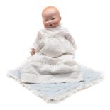 An Armand Marseille bisque head baby doll:, with moulded hair, blue glass eyes,