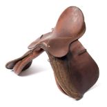 A brown leather 'Grand Prix' saddle by Butler Bros, Walsall:.