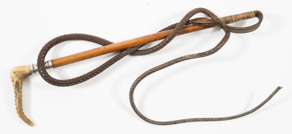 A silver mounted antler handled riding whip by Champion and Wilton, London:.