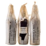 Three bottles of Rutherford and Miles 1934 Madeira Bual in original tissue:.