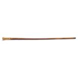 A 19th century yellow metal mounted walking cane:,