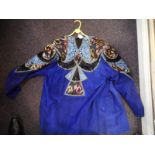 Roberto Cavalli (1940-) a two piece blue suede trouser suit:, of small size,