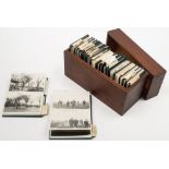 A personalised collection of 26 wallets containing monochrome photographs from the family of