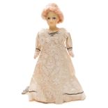 A late 19th century Continental wax shoulder headed doll:, applied wig,