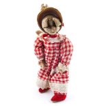A mid-20th century anthropomorphic cat doll in gingham dress:, 52cm high.