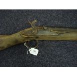 An early 19th century four bore percussion cap converted fowling gun:,