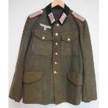 4.1.) Uniformen / Kopfbedeckungen Wehrmacht: Felbluse für einen Major der Artillerie.Feldgraues
